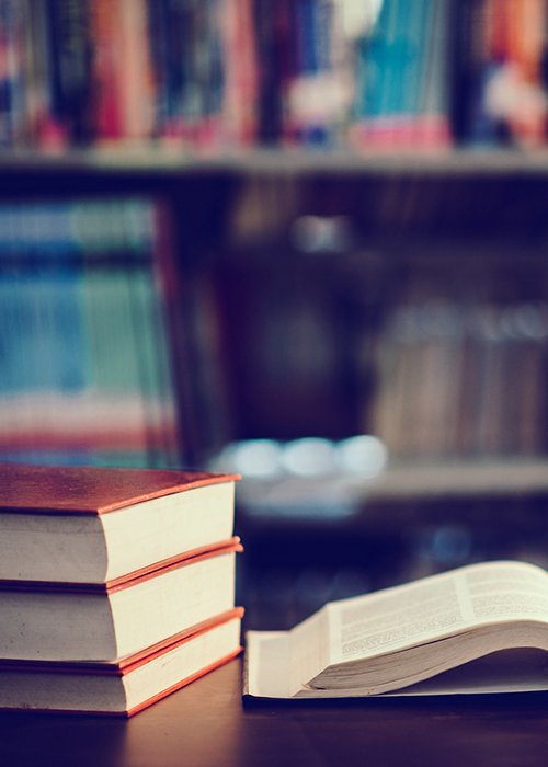 Book in library with open textbook,education learning concept Book in library with open textbook,education learning concept