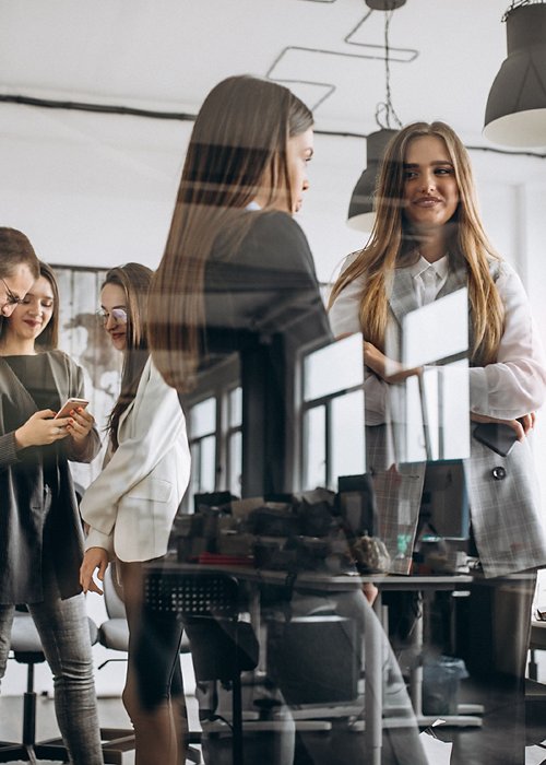 Group of people working out business plan in an office