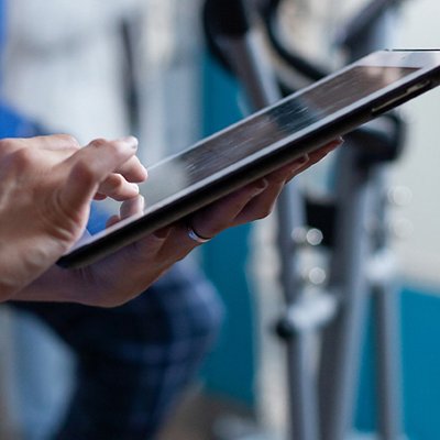 Close up of medical assistant touching tablet display Close up of medical assistant touching tablet display