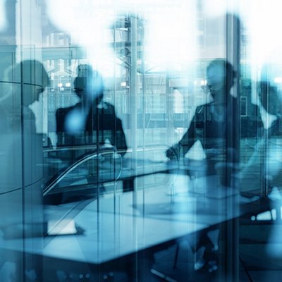 Group of business people work together in office