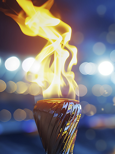 Burning torch close-up with broken background. Fire concept