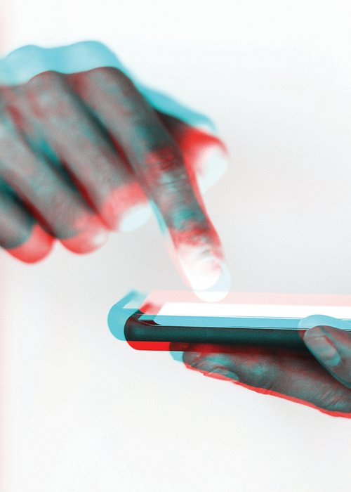 Hand and futuristic smartphone in double color exposure effect