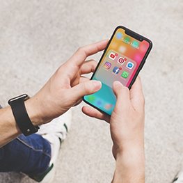 overhead-view-man-s-hand-using-social-media-app-mobile.jpg overhead-view-man-s-hand-using-social-media-app-mobile.jpg