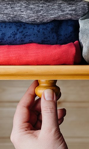 Neatly ordered clothes in drawer Neatly ordered clothes in drawer