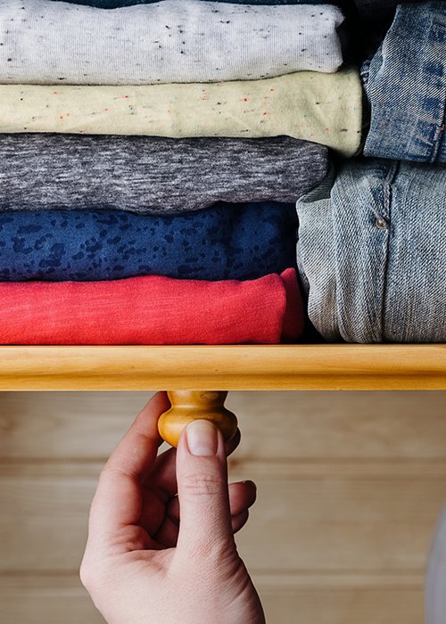 Neatly ordered clothes in drawer Neatly ordered clothes in drawer